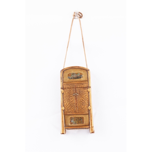 41 - Title: A single case inro modelled as a chest.
Date: 19th century
Size: 9.8 x 2.2 x 4.8 cm
Condition... 