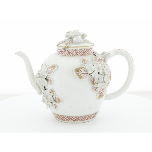 94 - Title: Arita Teapot
Date: Early 18th Century
Dimensions: 14.8 x 12.7 x 16 (including handle) cm
Cond... 