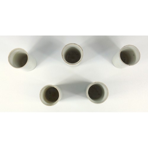 157 - Rupert Spira set of five Rupert Spira (b.1960) stoneware off-white glazed cylindrical beakers, raise... 