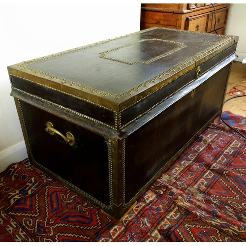 60 - Leather and cedar wood trunk, with brass mounts and studded decoration, 50 x 106 x 54 cm. Provenance... 