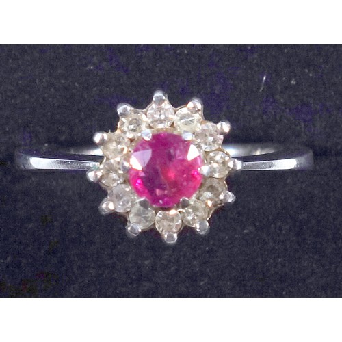 10 - Vintage ruby and diamond cluster ring, in 18 ct white gold, ring size M, 3.7 grams