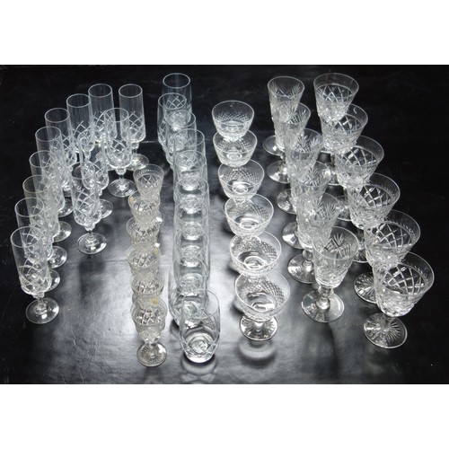 69 - Cut glass drinking glasses, twelve champagne flutes, six each of sherry, wines, small wines, sundae,... 