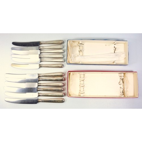 452 - Large selection of cutlery to include silver handle dinner and bread knives, c. 1971, sets of Sheffi... 