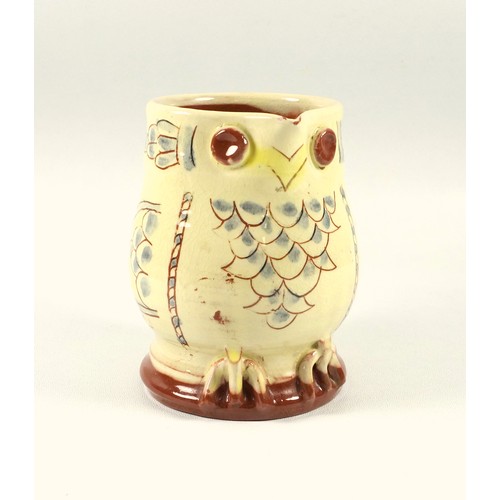 513 - Mary Wondrausch, an owl jug with slipware and painted decoration, 12 cm and a copy of the book Brick... 