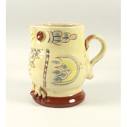 513 - Mary Wondrausch, an owl jug with slipware and painted decoration, 12 cm and a copy of the book Brick... 