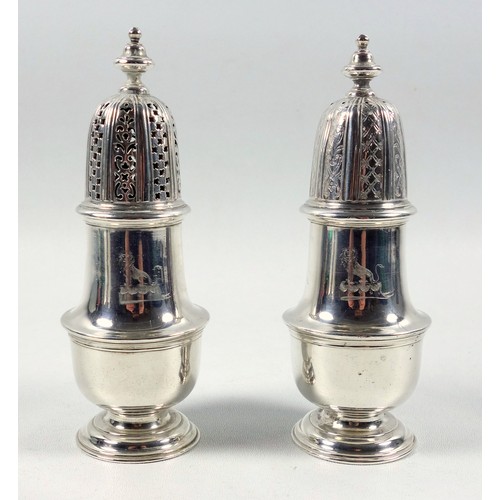 458 - Pair of George ll silver baluster casters, each with a lion and a shield crest, and a domed cover wi... 