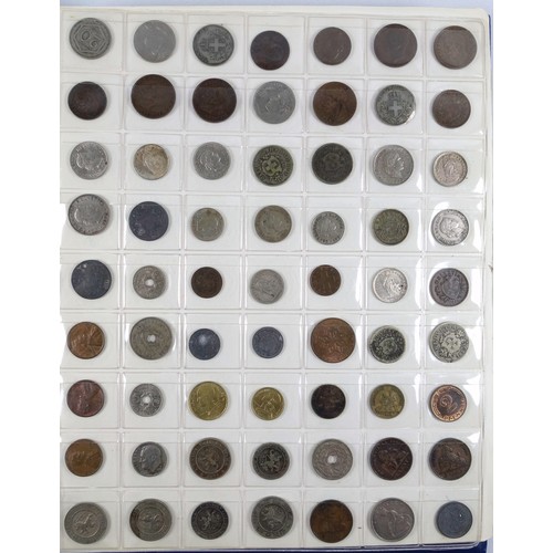 70 - Album containing 14 sheets of coins, British, Colonial and other silver and copper coins of the worl... 