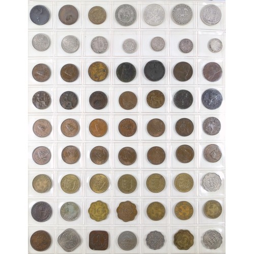 70 - Album containing 14 sheets of coins, British, Colonial and other silver and copper coins of the worl... 