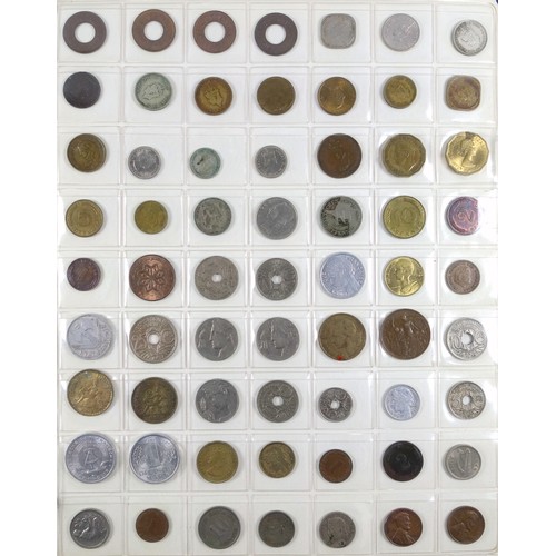 70 - Album containing 14 sheets of coins, British, Colonial and other silver and copper coins of the worl... 