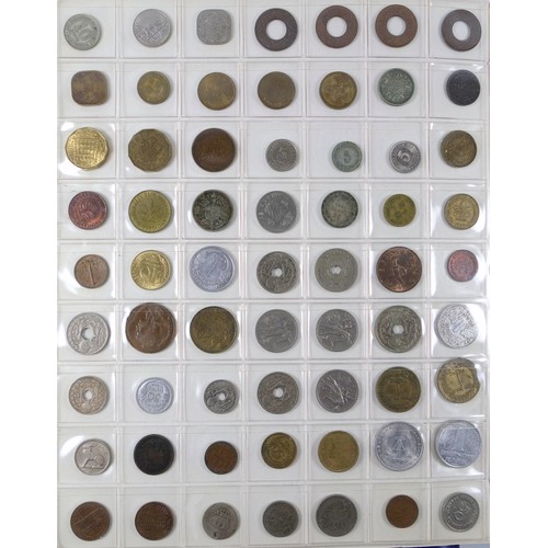 70 - Album containing 14 sheets of coins, British, Colonial and other silver and copper coins of the worl... 