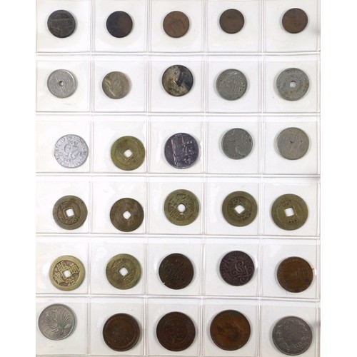 70 - Album containing 14 sheets of coins, British, Colonial and other silver and copper coins of the worl... 