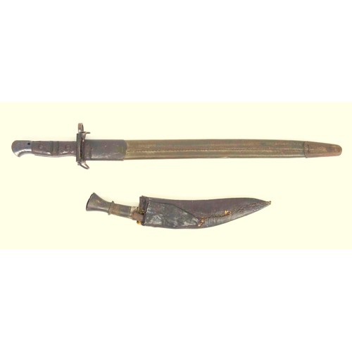 96 - American bayonet with a fullered steel blade, 43cm, and wood hilt, by Remington, 1917, in a leather ... 