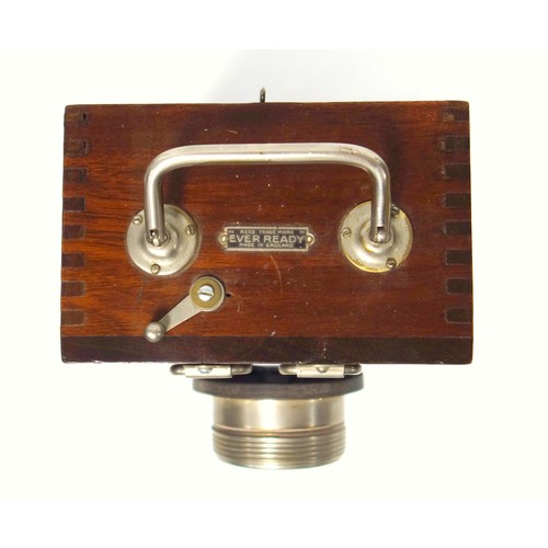 123 - Eveready adjustable carrying lamp with folding handle and “The Flag” dry cell battery, in a mahogany... 