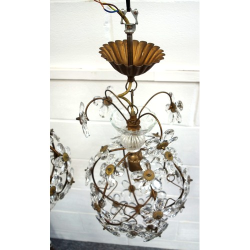 136 - Pair of gilt lacquered spherical ceiling lights with faceted glass floral decoration, H 38cm (2)