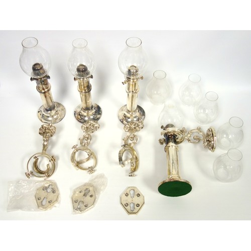 138 - Set of four silver plated Arctic spring loaded weighted candlesticks with gimbal brackets, wall plat... 