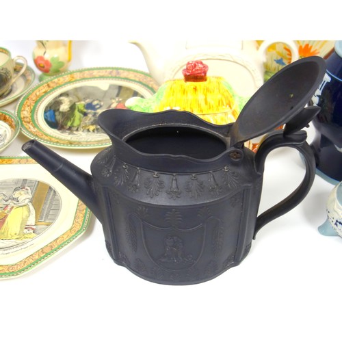 163 - Victorian black jasperware shaped oval teapot with classical figures and floral decoration in relief... 