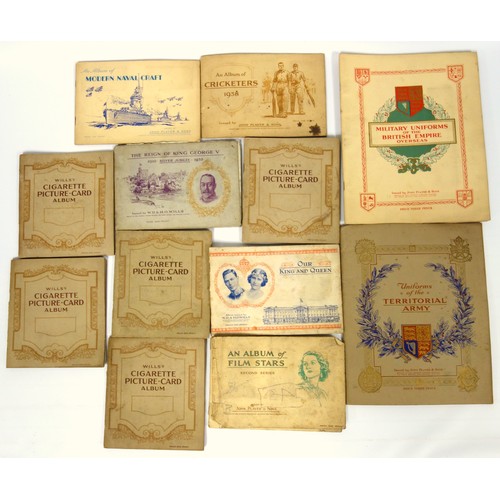 271 - Strand album containing German and other stamps of the world, loose stamps, 5 large cigarette card a... 