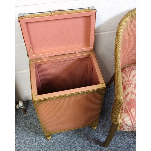 330 - Kraft pink and gilt loom armchair with a patterned upholstered seat, and a rectangular linen bin wit... 