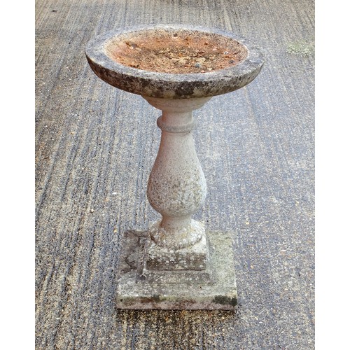 343 - Composition birdbath with a circular top, on a baluster column, square base, H 79cm, D 44.5cm