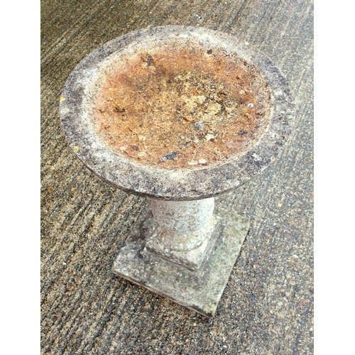 343 - Composition birdbath with a circular top, on a baluster column, square base, H 79cm, D 44.5cm