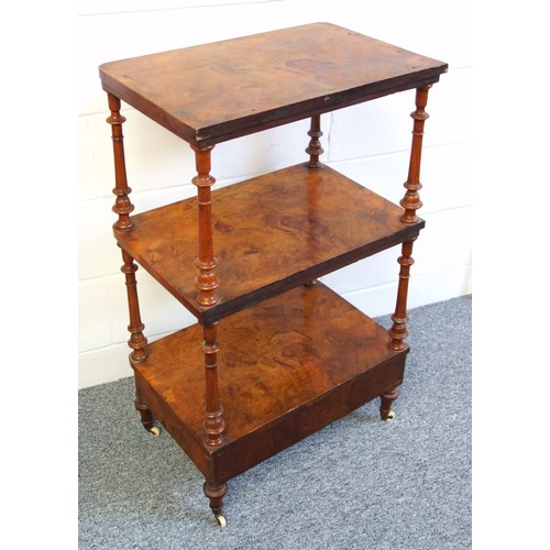 335 - Victorian walnut 3 tier whatnot with a drawer below, on turned columns, tapering feet and castors, W... 