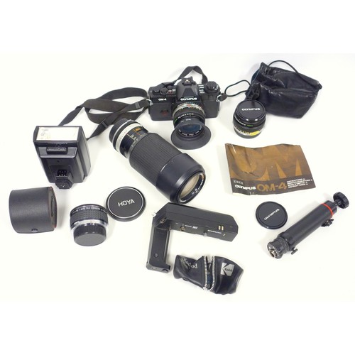 344 - Olympus OM-4 5LR 35mm camera with a Zuiko 28mm 1.28 lens, Hoya HMC zoom & Macro 70-210 lens, Zuiko f... 