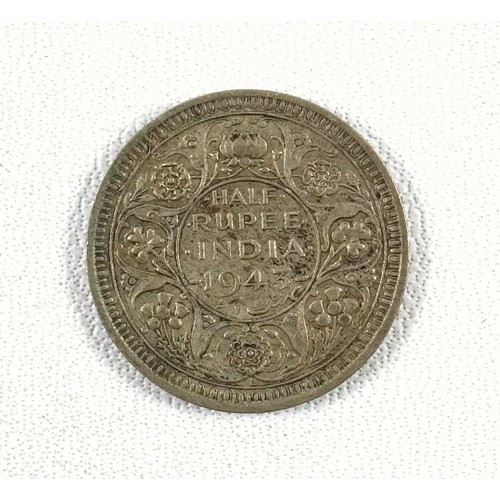 13 - Album containing foreign silver and other coins including Charles III 8 reales, 1787, Mexico mint, v... 