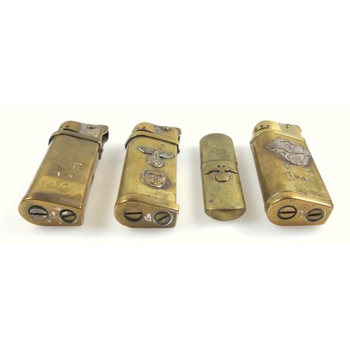 146 - WW2 German brass pocket lighters, three with applied German Nazi eagle emblems and stamped, one stam... 