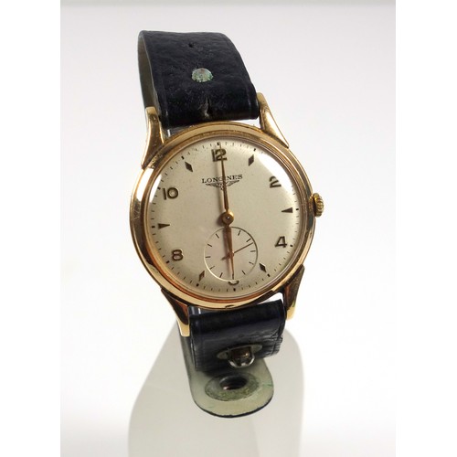 37 - Longines yellow metal gentleman's wristwatch with an ivory coloured dial, seconds dial, Arabic and a... 