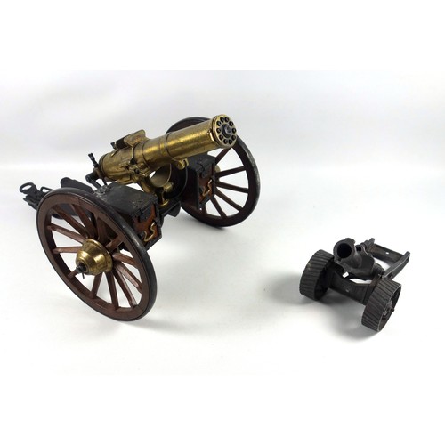 70 - Desktop model of a Gatling field gun, the brass barrel with turning mechanism mimicking firing actio... 