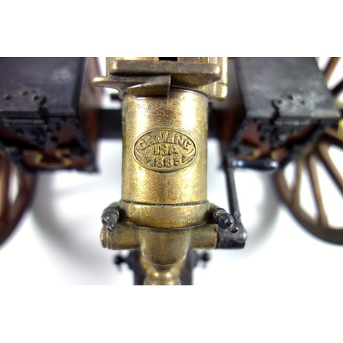 70 - Desktop model of a Gatling field gun, the brass barrel with turning mechanism mimicking firing actio... 