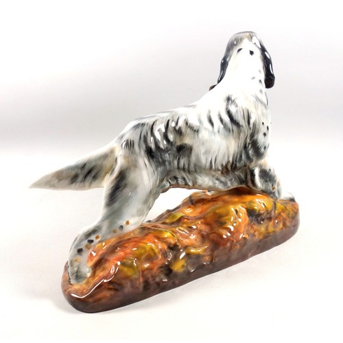 150 - Royal Doulton figure of an English setter carrying a pheasant, HN 2529, 22cm x 27.5cm