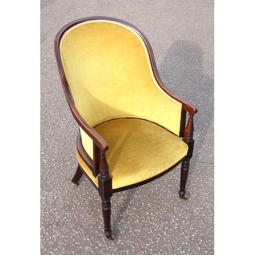 224 - Regency mahogany tub shaped armchair with a reeded high back, arms and bow fronted, upholstered in o... 