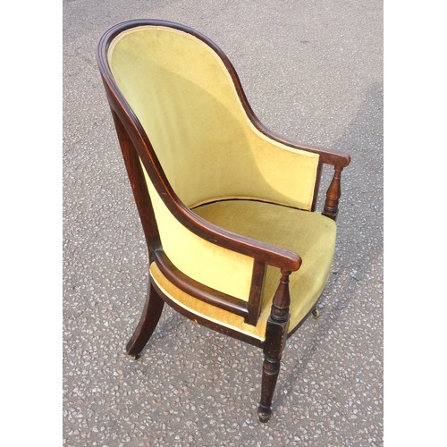 224 - Regency mahogany tub shaped armchair with a reeded high back, arms and bow fronted, upholstered in o... 