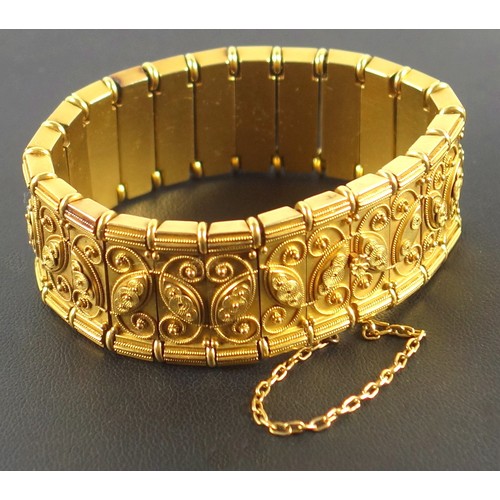 441 - Late 19th century French gold archaeological revival bracelet with wire scroll and bead decorated pa...
