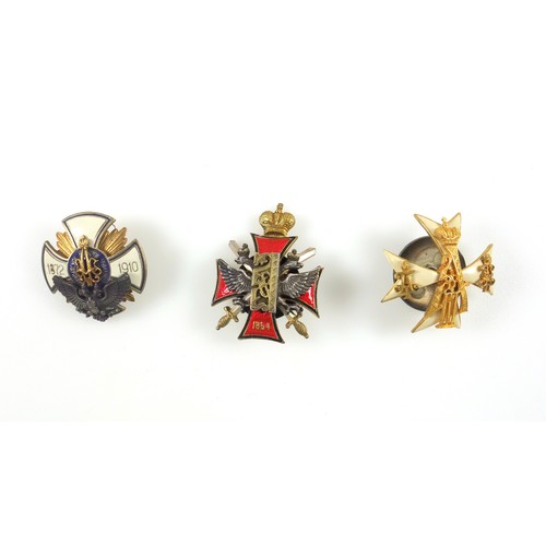 61 - Russian Imperial gilt metal military badges (possibly reproductions), in the form of a white enamell... 