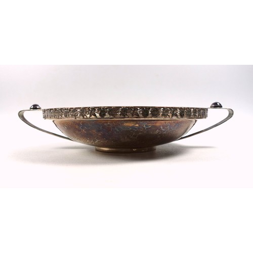 45 - Arts and Crafts silver twin handled hammered footed bowl with set cabochons to handles and pierced f... 