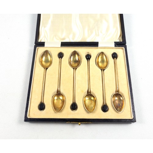 46 - Set of 6 gilt silver coffee spoons with coloured enamel shell backs and bean tops by Barker Brothers... 