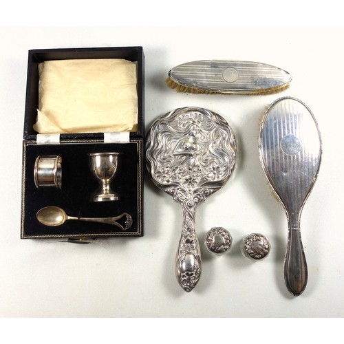 18 - Silver christening set, comprising spoon, egg cup and napkin ring, by Lanson Ltd., Birmingham 1960, ... 
