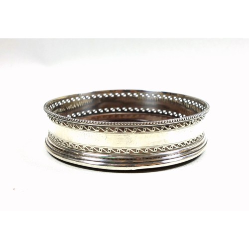26 - George III silver wine bottle coaster with 2 bands of pierced and bright cut decoration, beaded rim,... 