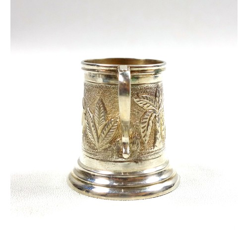 32 - Indian silver miniature mug with embossed elephant and foliate decoration, stamped 