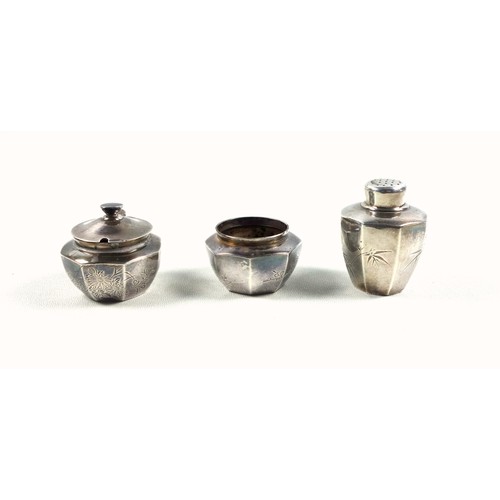 52 - Oriental silver 3 piece cruet set, comprising mustard pot, salt and pepperette, each of octagonal fo... 