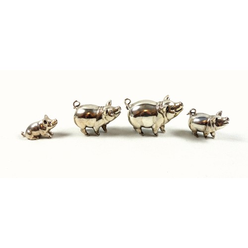 62 - Hollow cast silver family of 4 silver pigs, by M H, Birmingham, 104grs. (4)