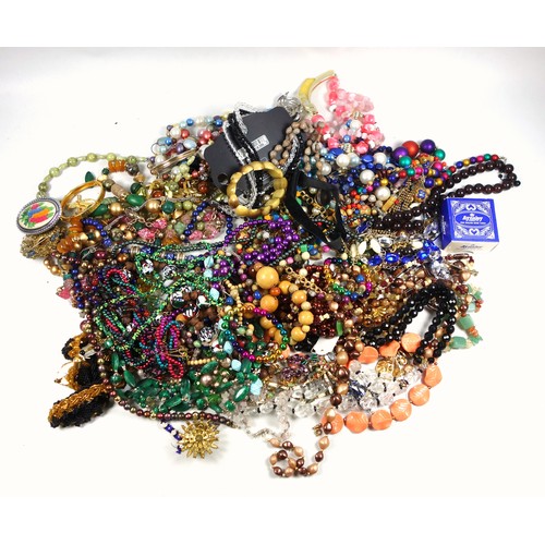 68 - Large quantity of necklaces, brooches, and other costume jewellery. (a lot)