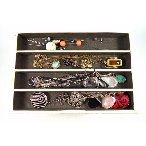 73 - Three jewellery boxes containing a good quantity of costume jewellery including brooches, rings, nec... 