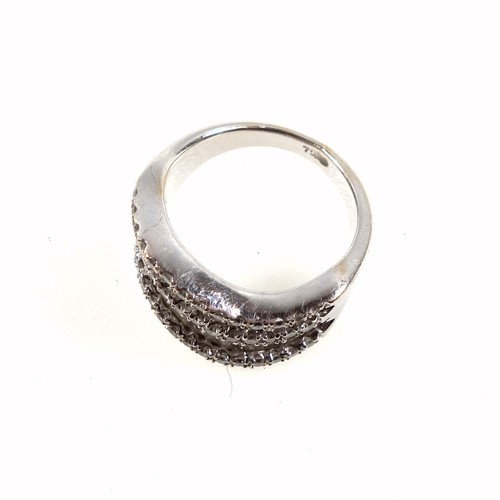 87 - White metal ring set 26 baguette and 42 round cut diamonds, stamped 