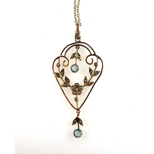 93 - Edwardian 9ct gold floral pendant necklace set seed pearls and aquamarines, gross 4.6 grams.