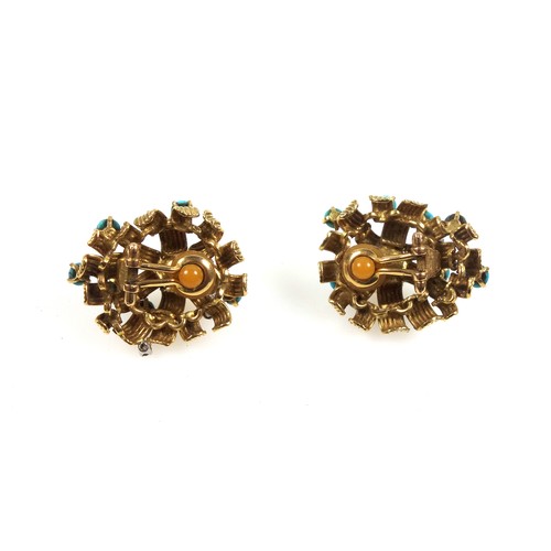 102 - Pair of yellow metal floral design clip-on earrings, each set with cabochon turquoise, and brilliant... 