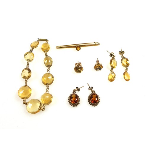 107 - Yellow metal tiepin set topaz, W.5.2cm, 3.1grs; pair of topaz pendant earrings, citrine faceted bead... 