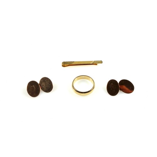110 - 9ct Gold wedding band, 9ct gold tie pin and a pair of 9ct gold oval cufflinks, 10.6 grams (4)